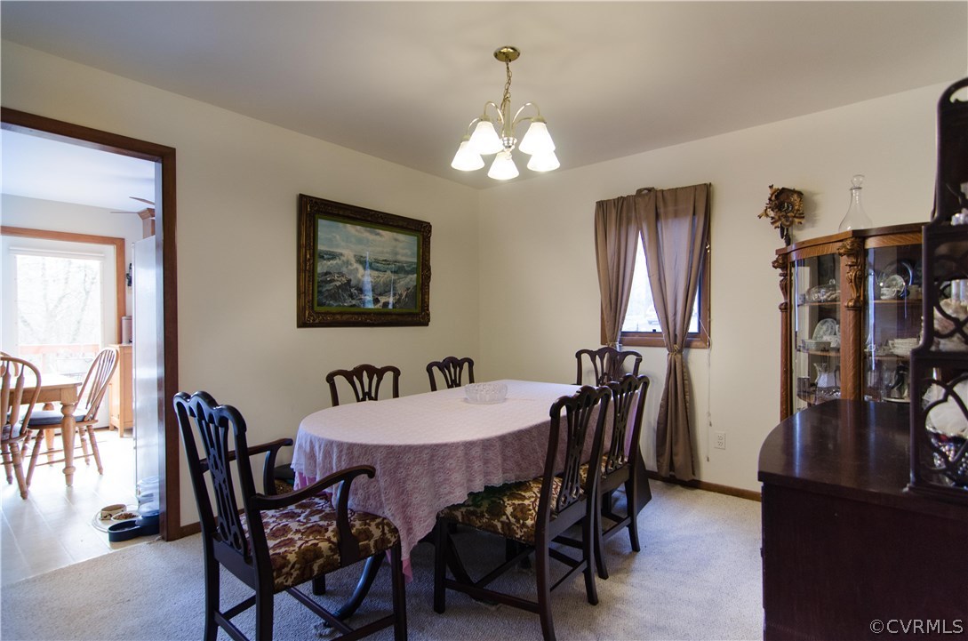 7720 Old Beach Road Chesterfield, VA 23838 - Photo 7 of 19 a view of a dining room with furniture