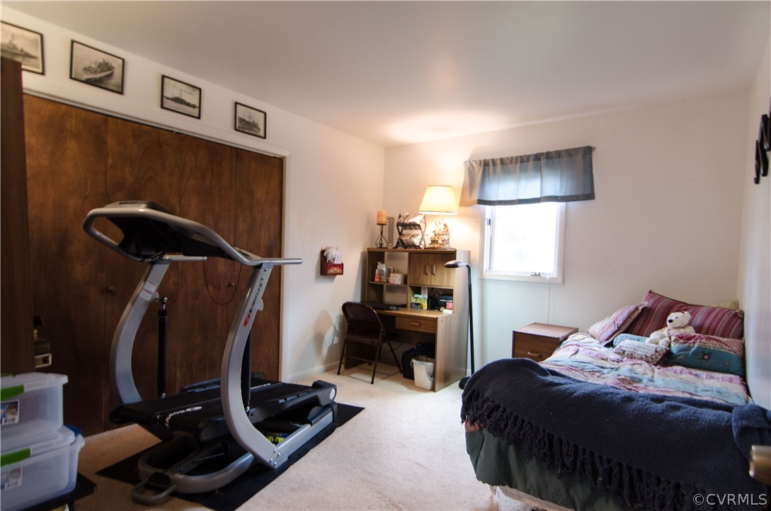 7720 Old Beach Road Chesterfield, VA 23838 - Photo 10 of 19 a bedroom with a bed and a desk