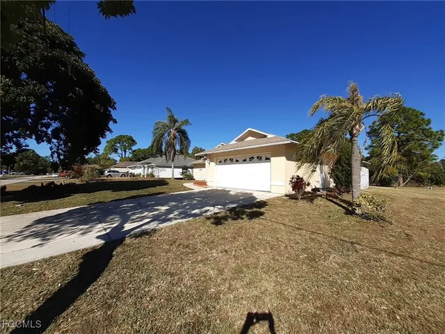 a view of a street with a building in the background