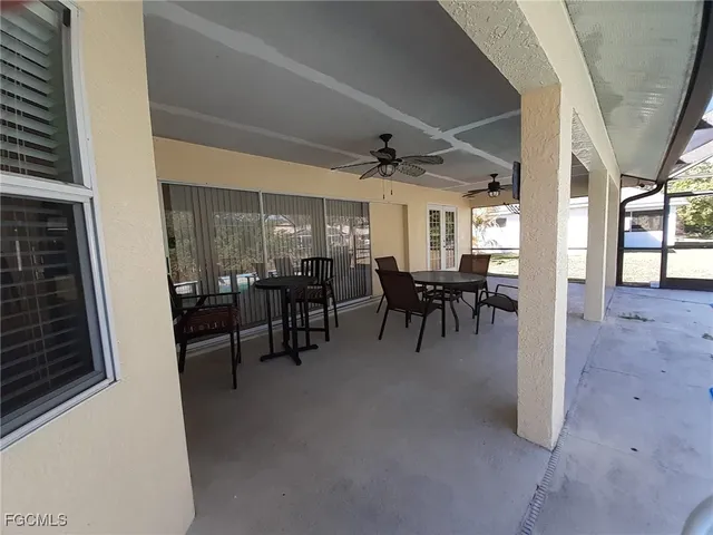 a view of a livingroom with furniture window and wooden floor