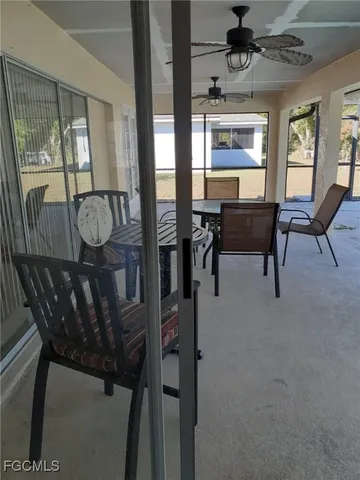 a kitchen with stainless steel appliances granite countertop a sink dishwasher a microwave oven with granite countertops and cabinets