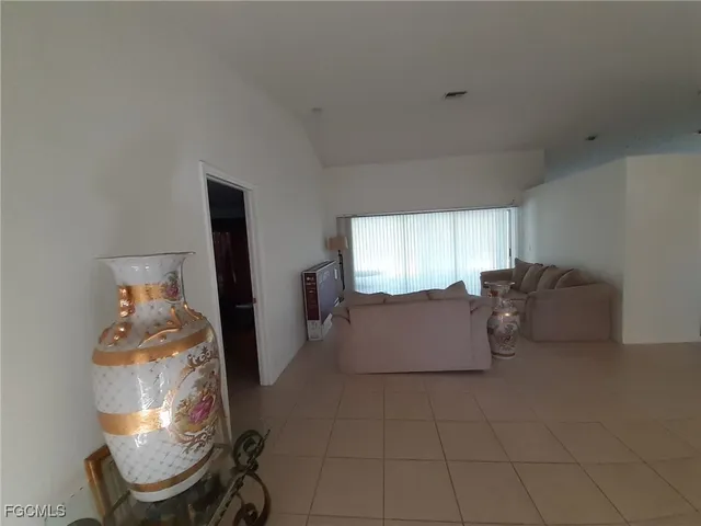 a view of a livingroom with furniture and window