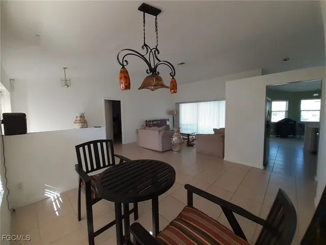 a bath room with a shower curtain and a sink