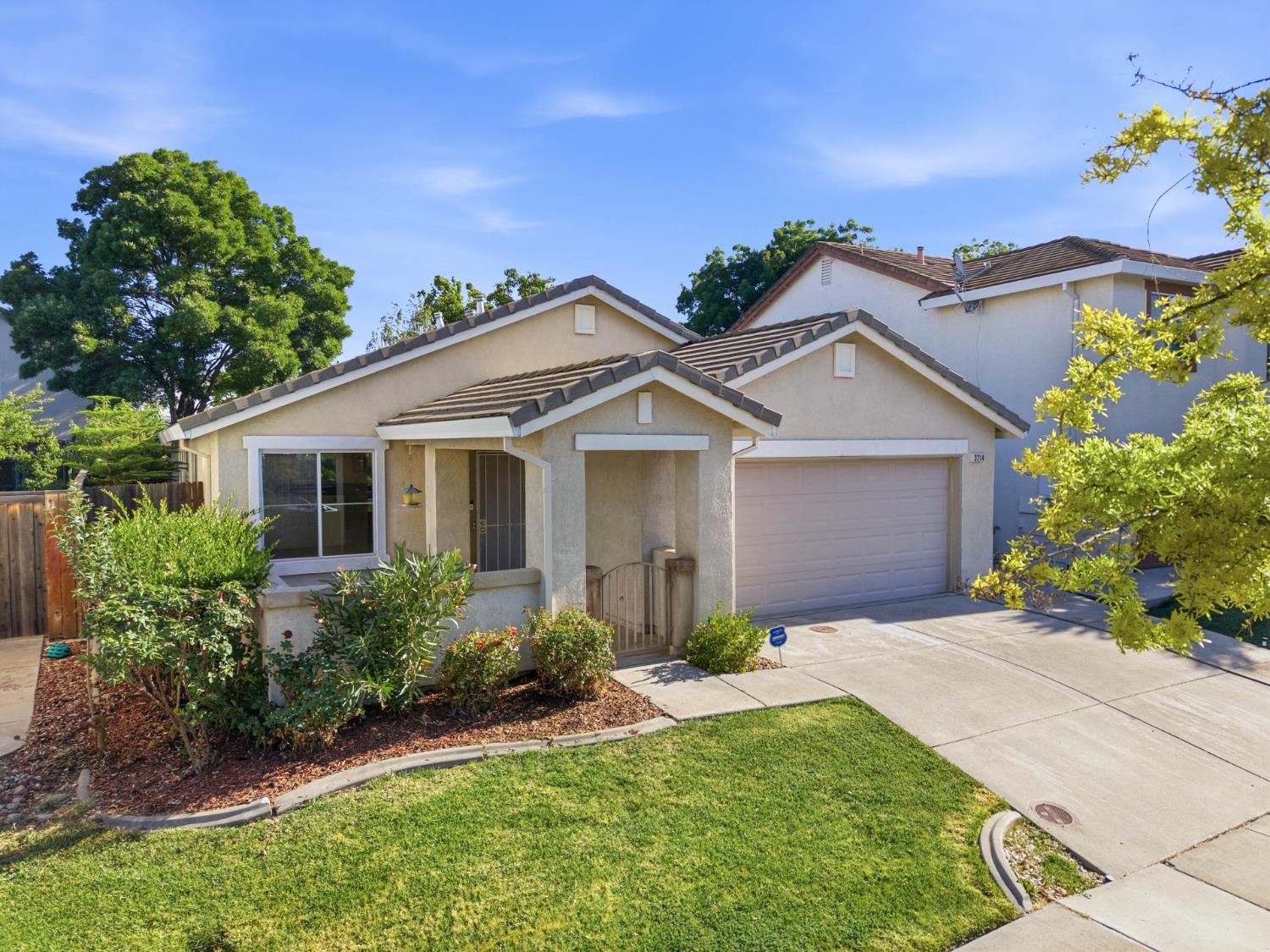 3214 Santa Cruz Road West Sacramento, CA 95691 - Photo 1 of 1 front view of a house and a yard