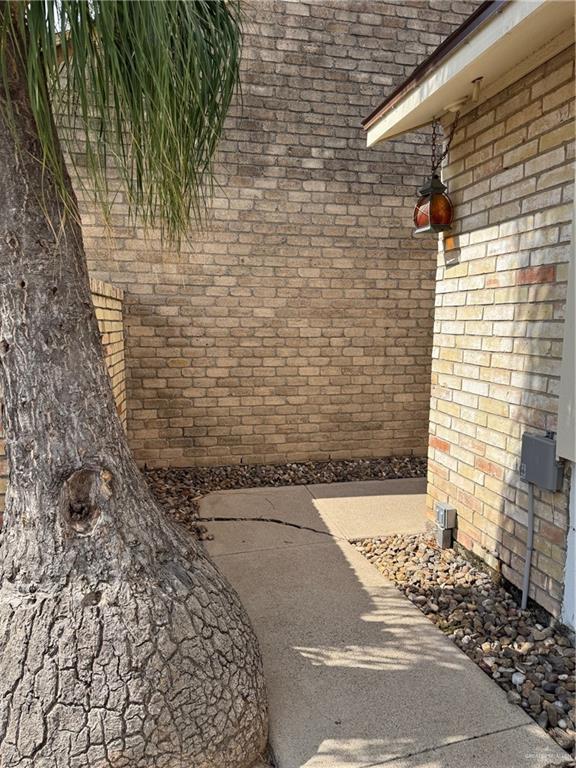 1206 Bluebird Avenue McAllen, TX 78504 - Photo 18 of 20 a view of a brick house with a street