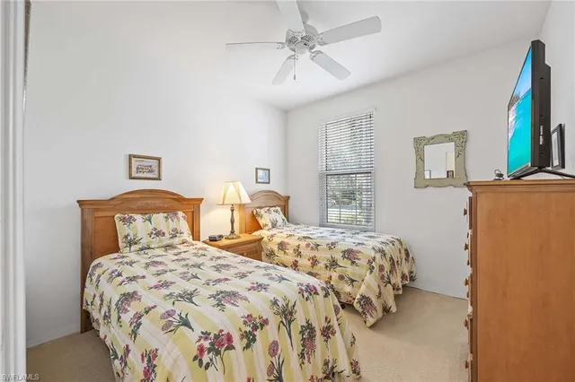 a bathroom with a toilet a sink and a mirror