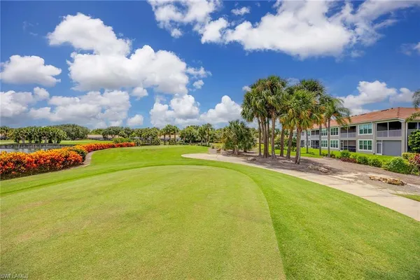 a view of swimming pool with a yard