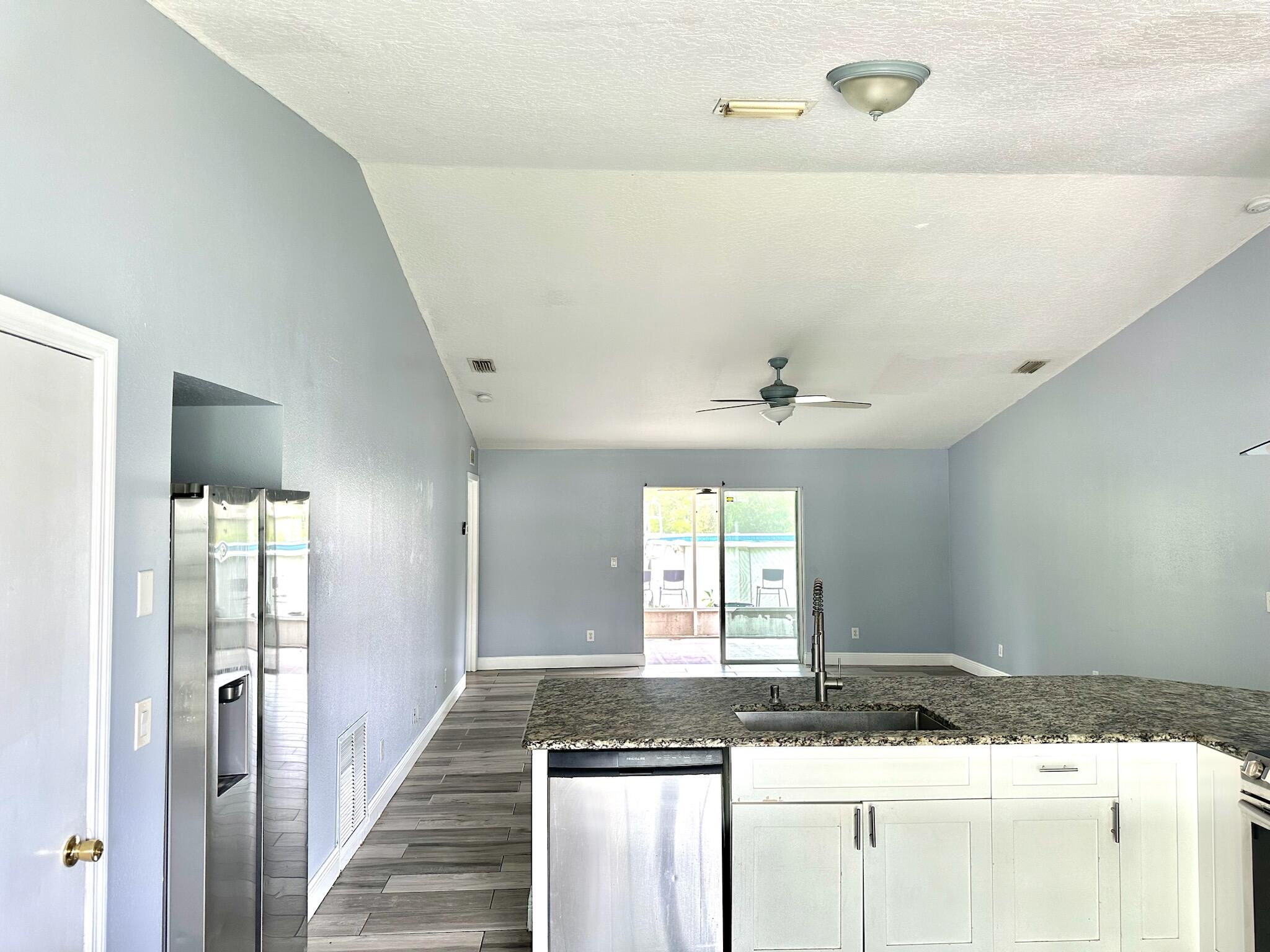 816 Tedder Road Southeast Palm Bay, FL 32909 - Photo 3 of 15 a room with storage and utility