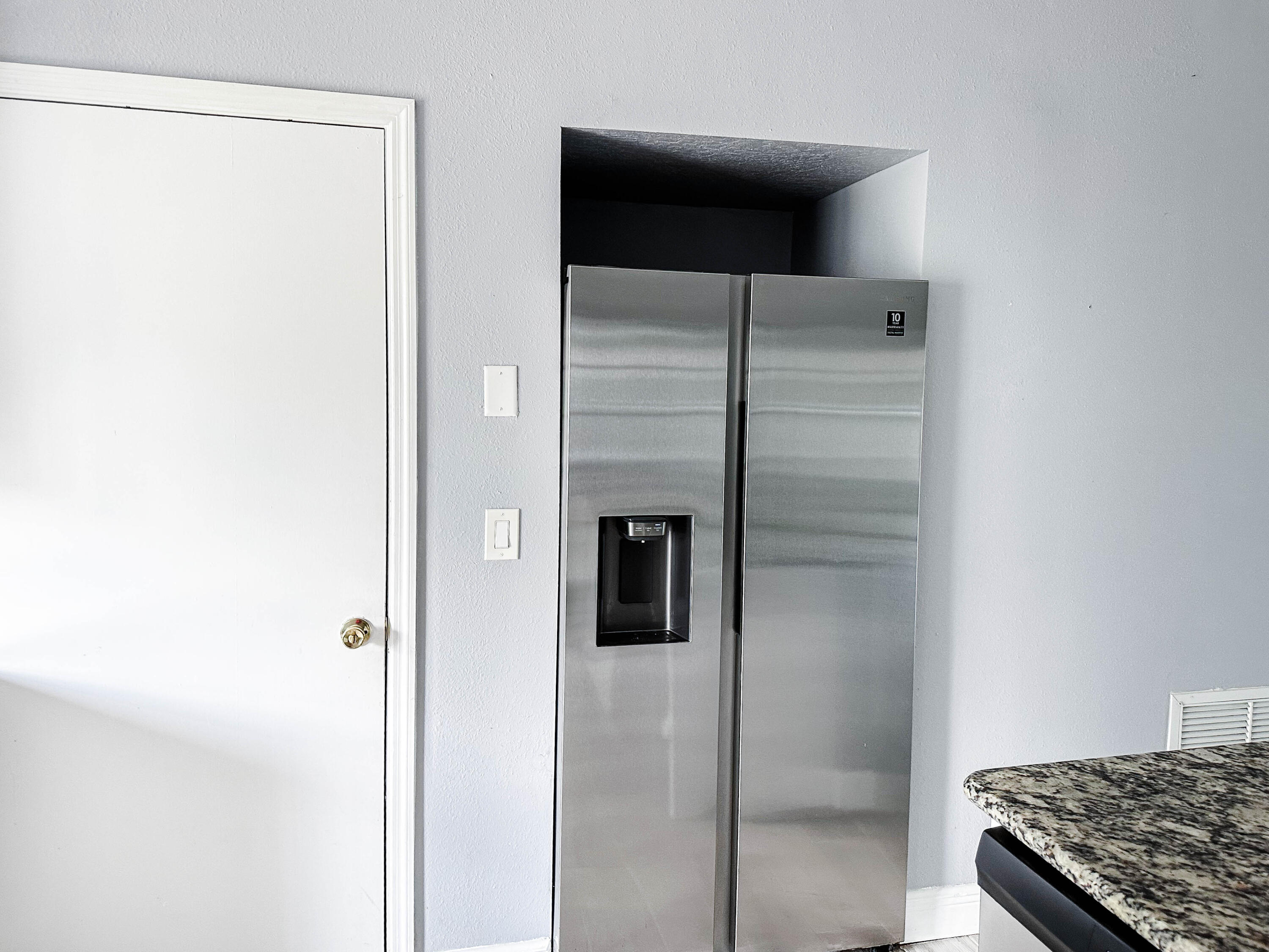 816 Tedder Road Southeast Palm Bay, FL 32909 - Photo 4 of 15 a view of kitchen and utility room