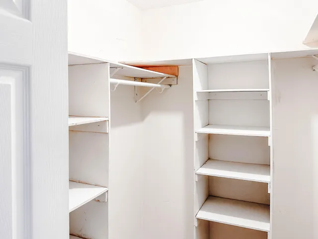 a utility room with cabinets