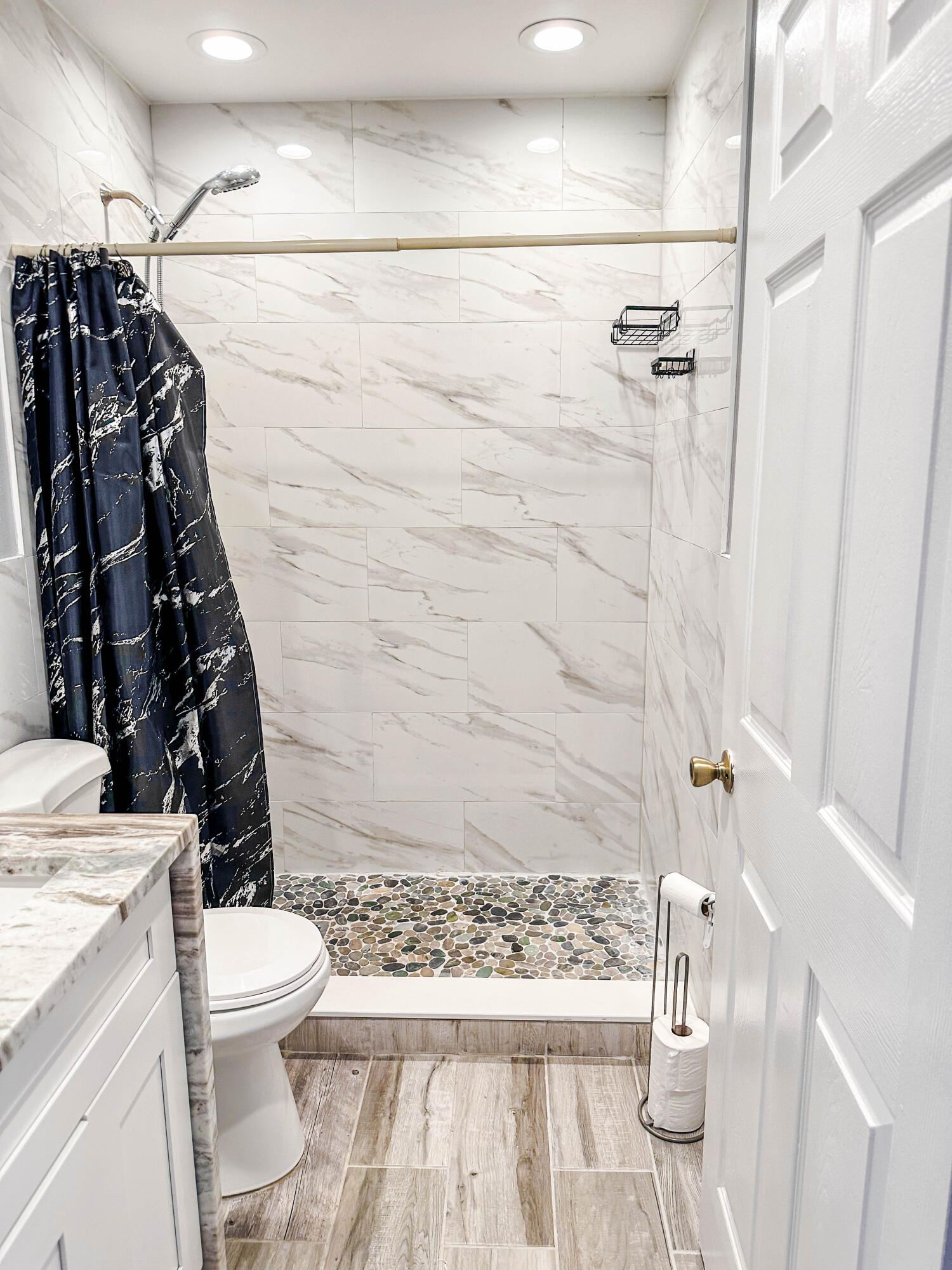 816 Tedder Road Southeast Palm Bay, FL 32909 - Photo 10 of 15 a bathroom with a sink a toilet and shower