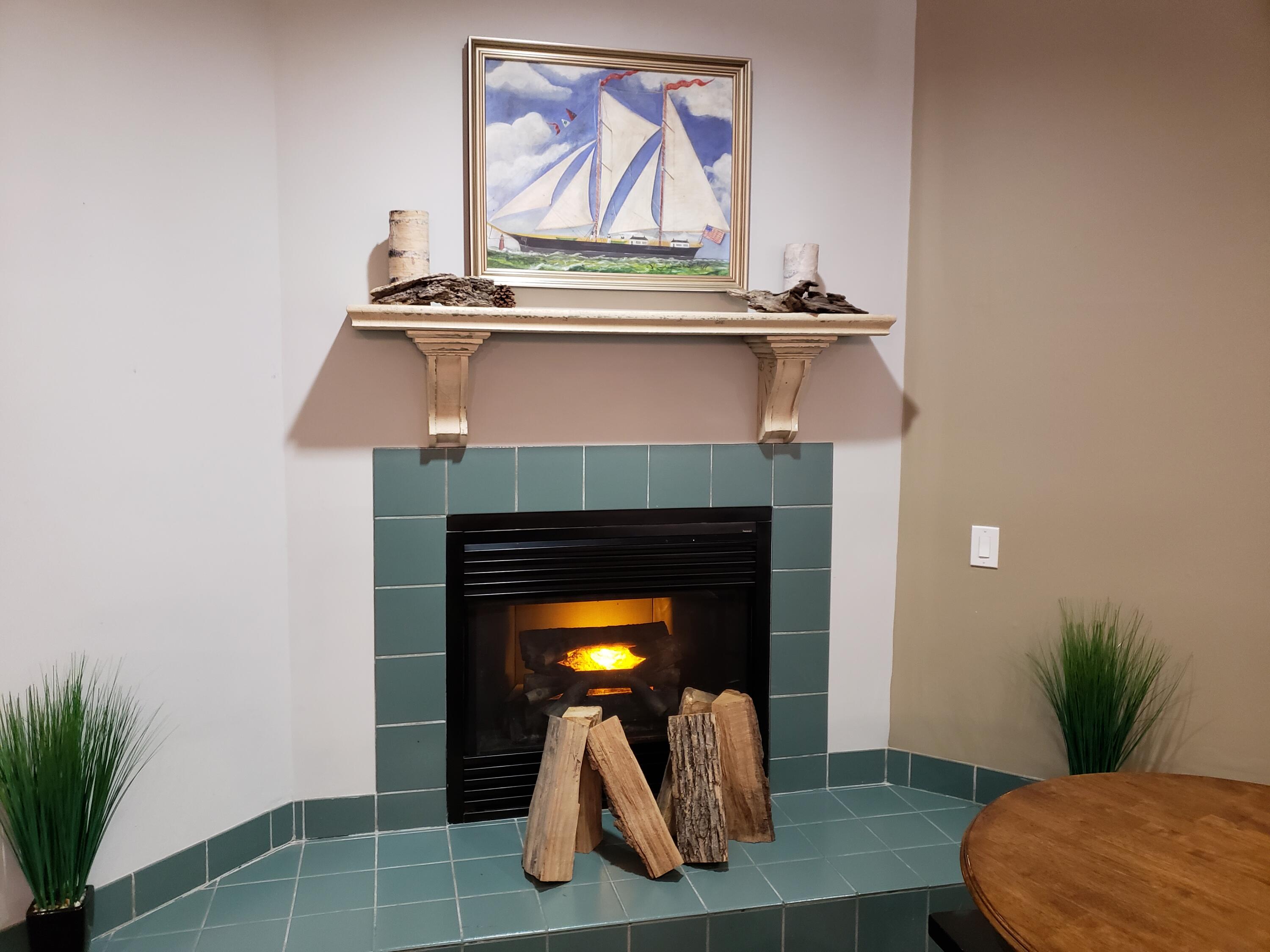 111 Center Street, Unit 235 Lake Geneva, WI 53147 - Photo 27 of 47 28 - Fireplace in Upper Lobby