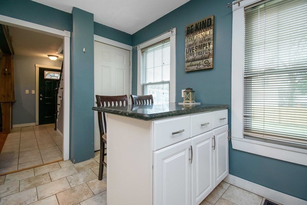 220 Nottingham Street Springfield, MA 01104 - Photo 15 of 30 a kitchen with a sink and cabinets