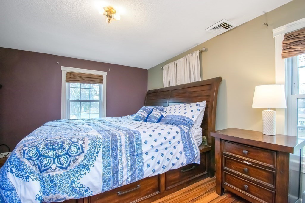 220 Nottingham Street Springfield, MA 01104 - Photo 18 of 30 a bedroom with a bed and a window