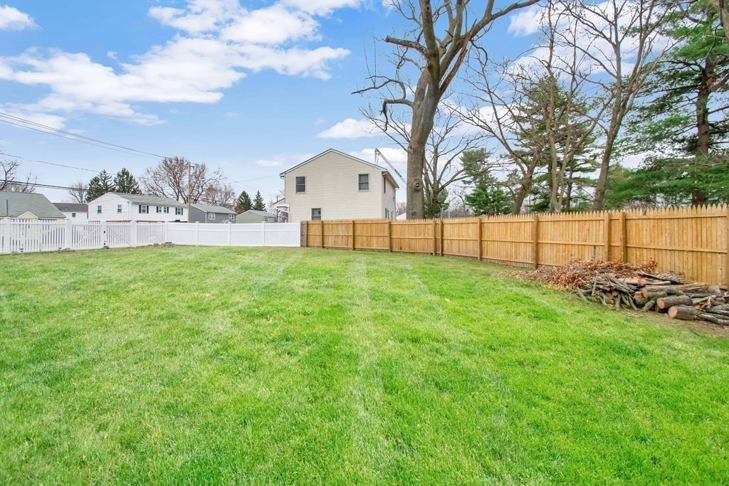 220 Nottingham Street Springfield, MA 01104 - Photo 27 of 30 a view of a backyard with a garden