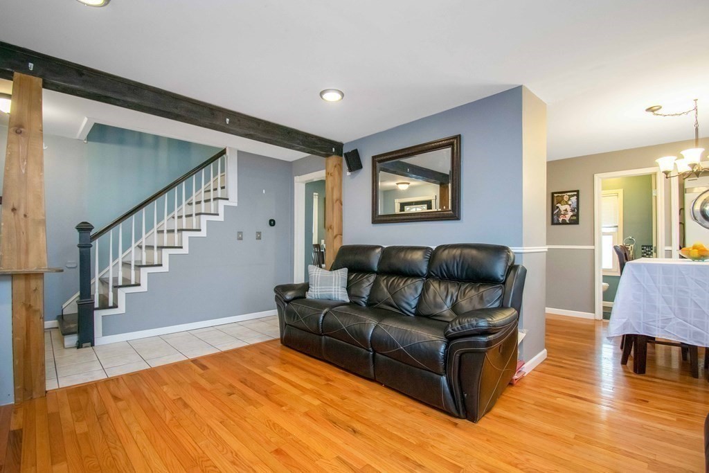 220 Nottingham Street Springfield, MA 01104 - Photo 7 of 30 a living room with furniture and a wooden floor