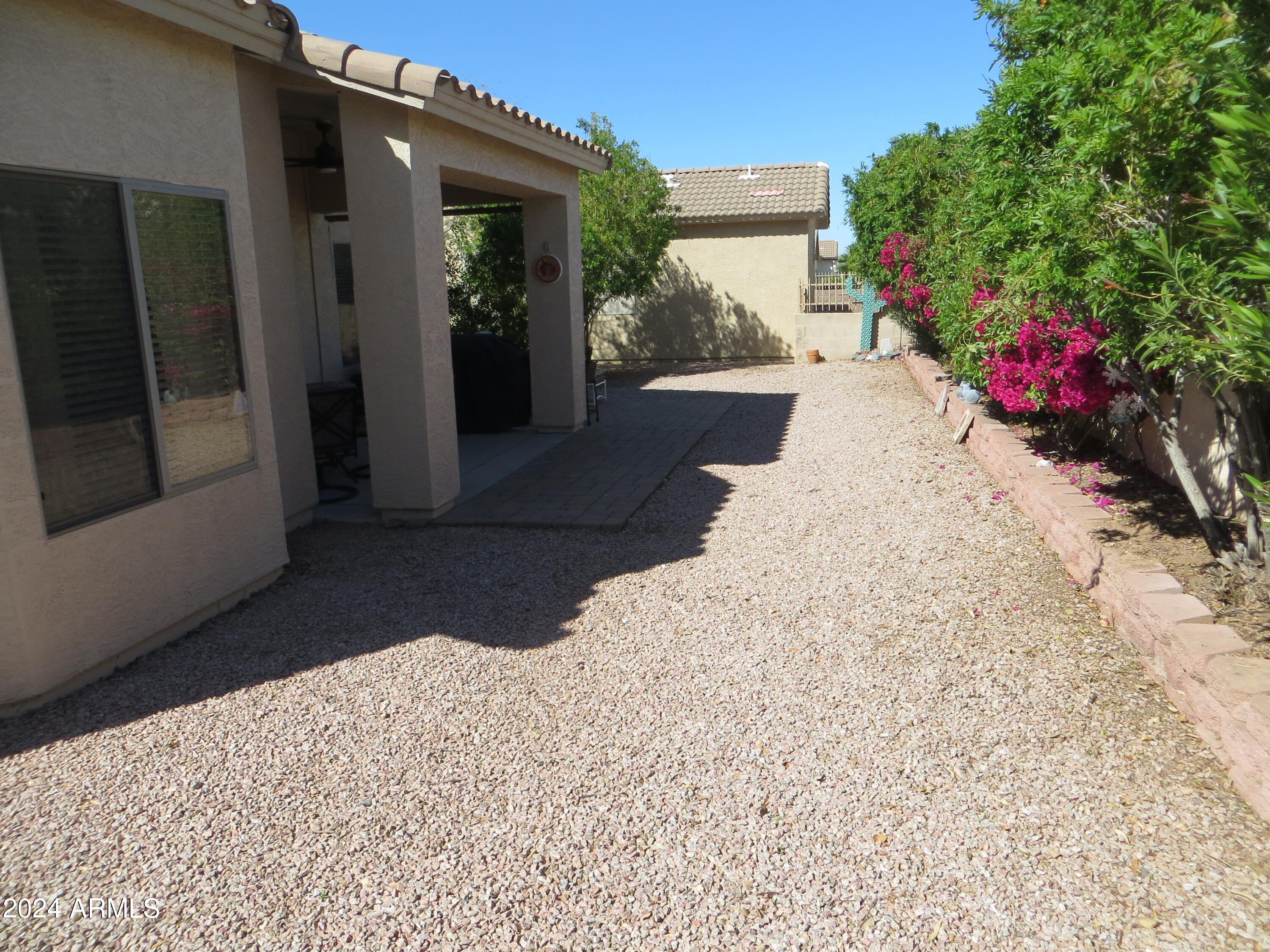 2101 South Meridian Road, Unit 34 Apache Junction, AZ 85120 - Photo 27 of 59 a view of a backyard of the house