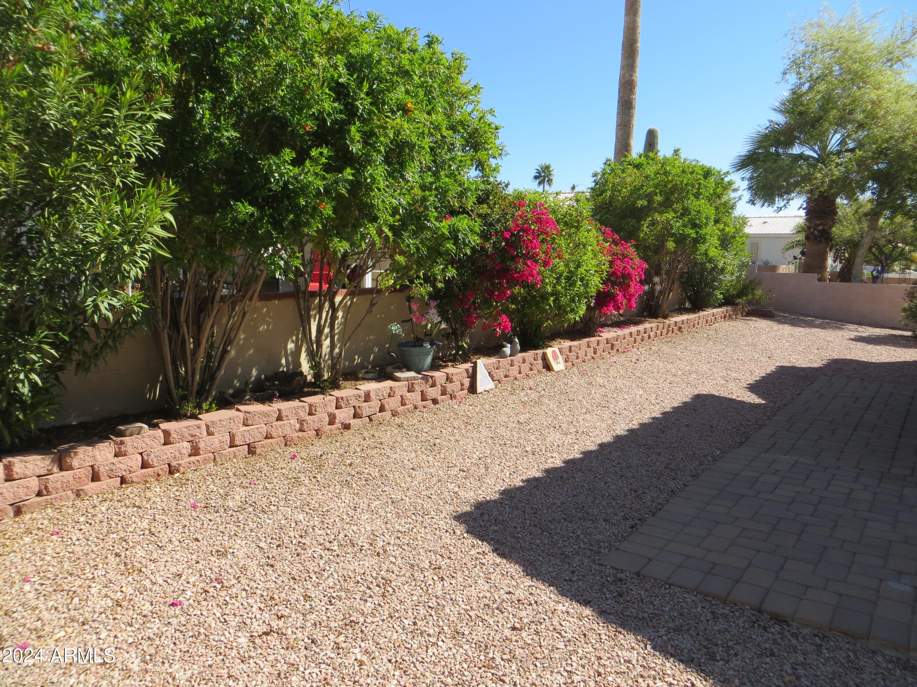 2101 South Meridian Road, Unit 34 Apache Junction, AZ 85120 - Photo 31 of 59 a view of a backyard of the house