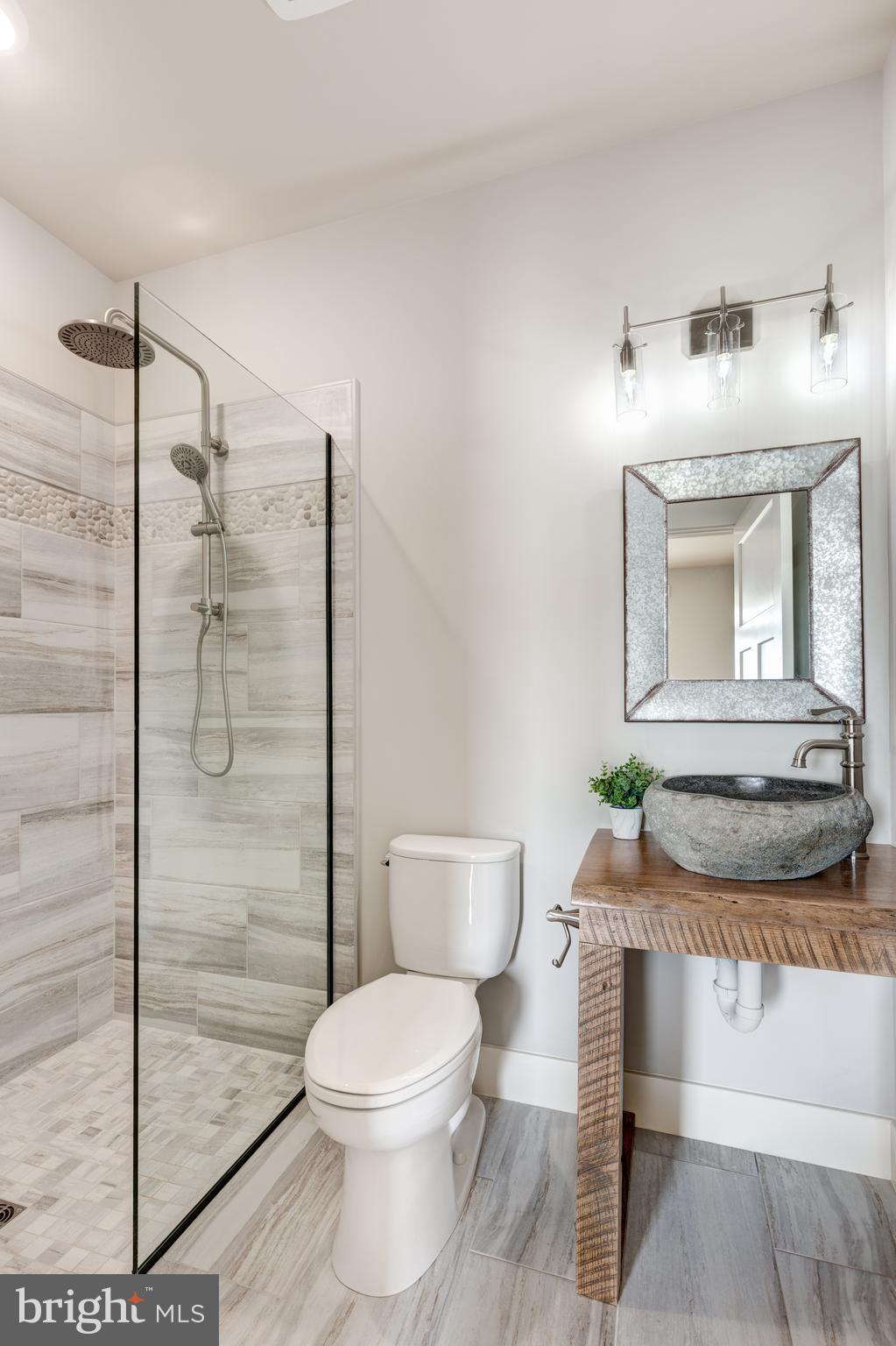 1360 Bollinger Road Westminster, MD 21157 - Photo 12 of 68 No edge flooring to shower & barn wood edge vanity