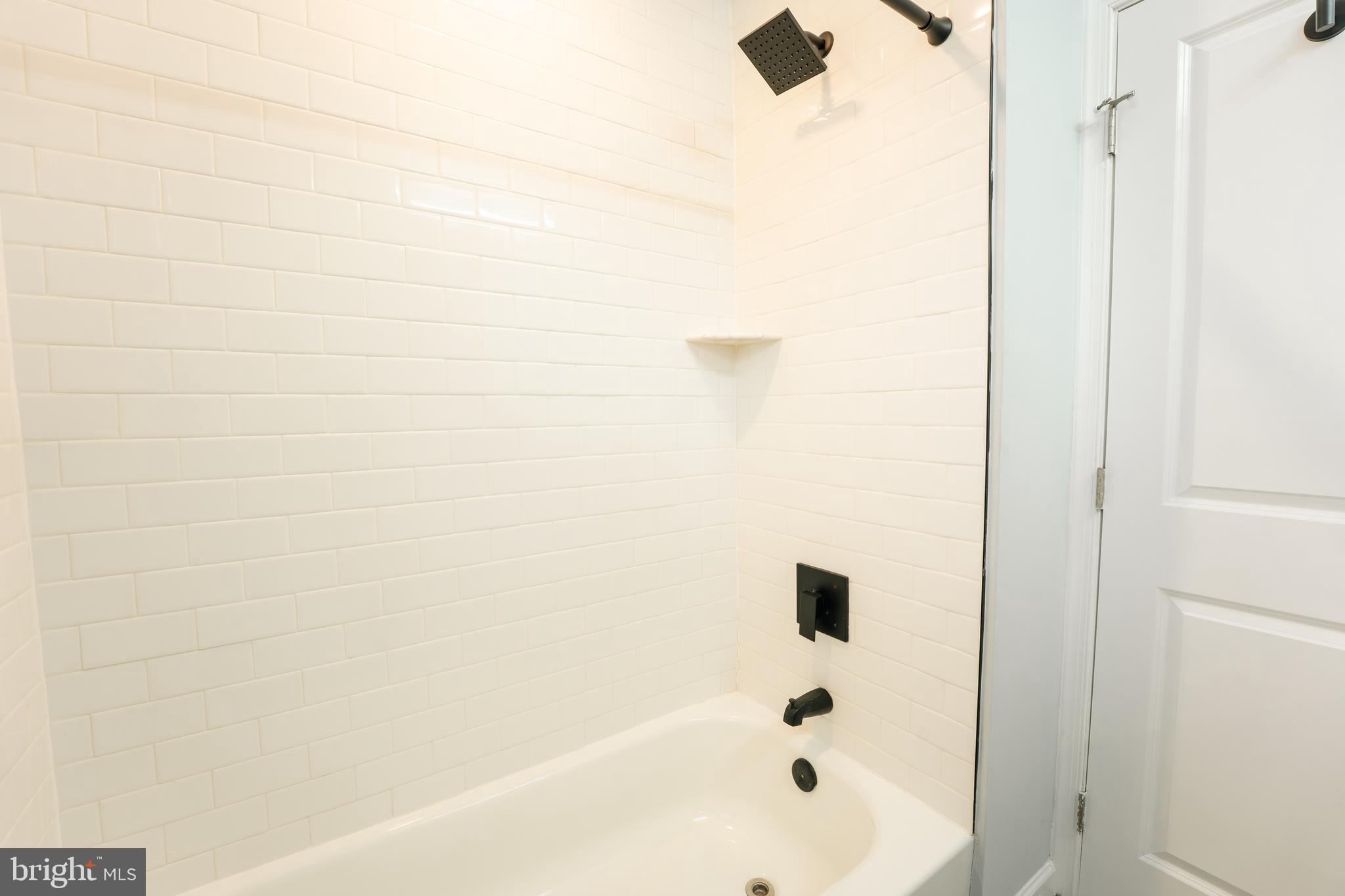 3410 Embry Street Silver Spring, MD 20902 - Photo 15 of 28 a bathroom with a bathtub