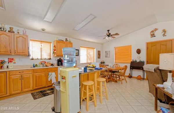 a view of a dining room with furniture window and outside view