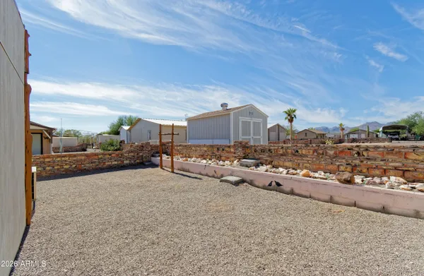 a view of a backyard of a house