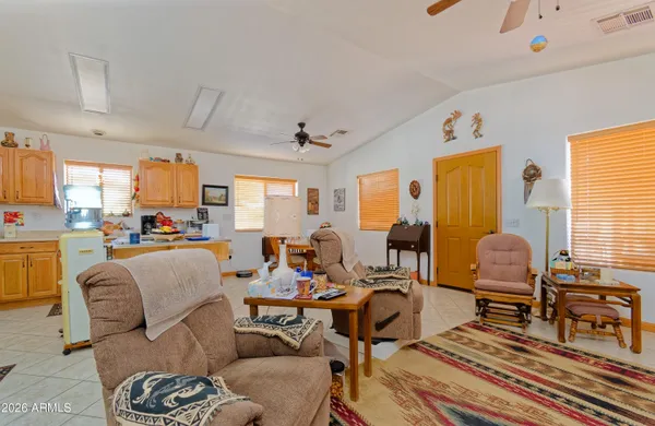 a living room with furniture or couch and a window