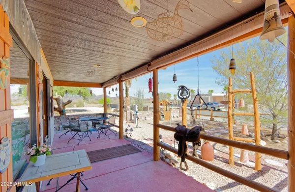 a view of a livingroom with furniture and a table
