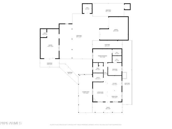 a front view of a house with large trees