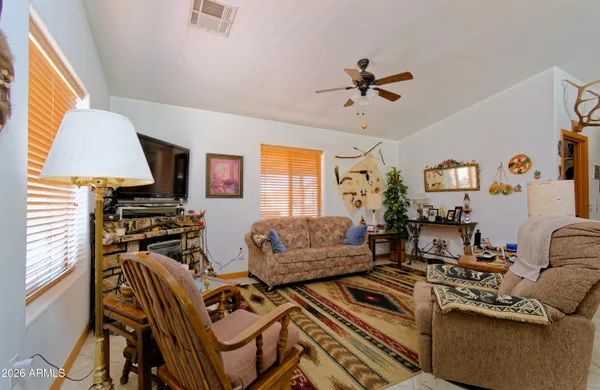 a living room with furniture and a window