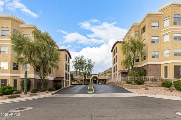 a view of city with tall buildings