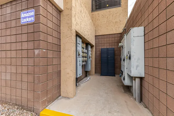 a view of a street with a building in the background