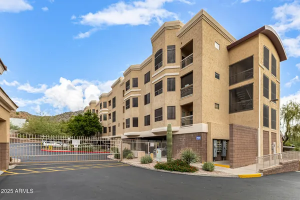 a front view of a building with street view