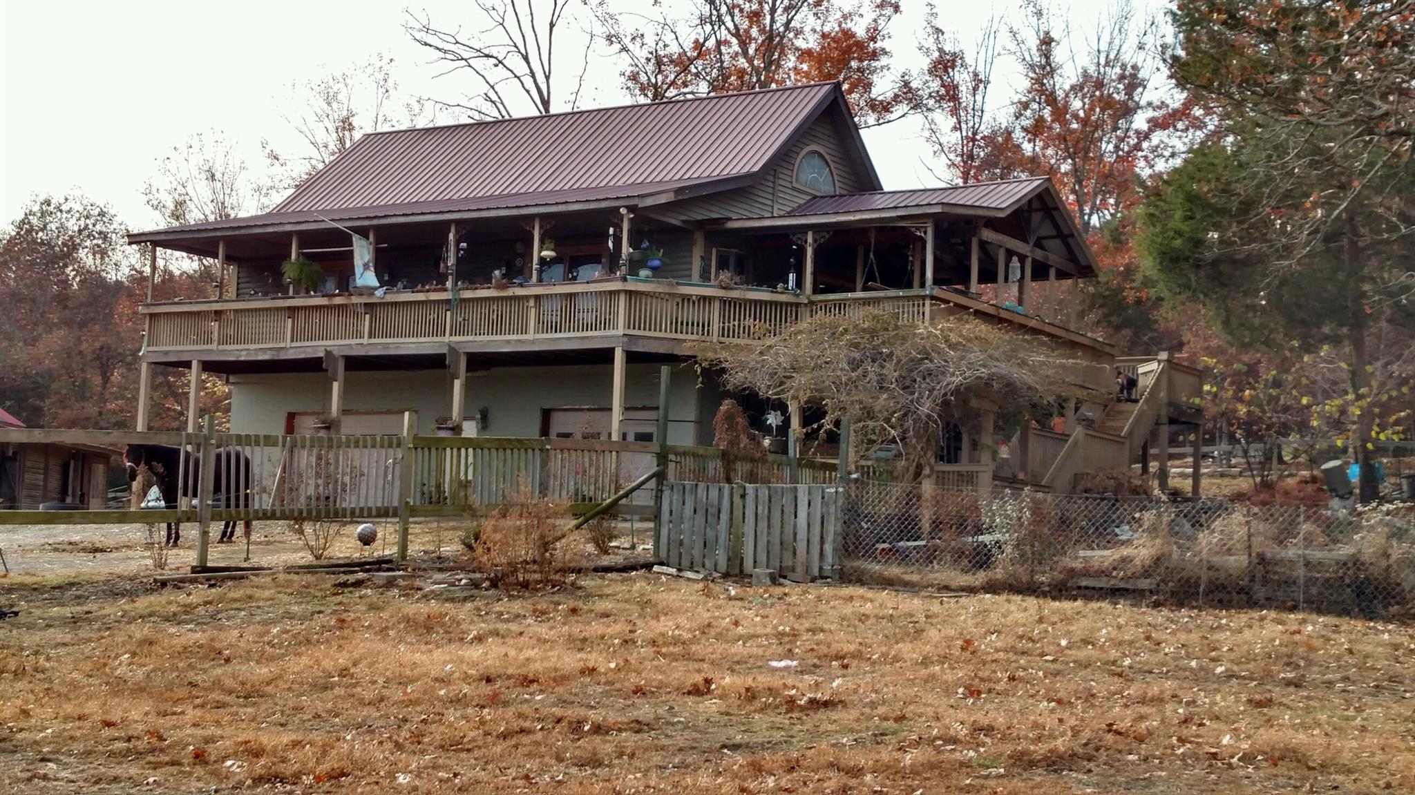 1300 Chicken Road Lebanon, TN 37090 - Photo 1 of 15 a front view of a house with a yard
