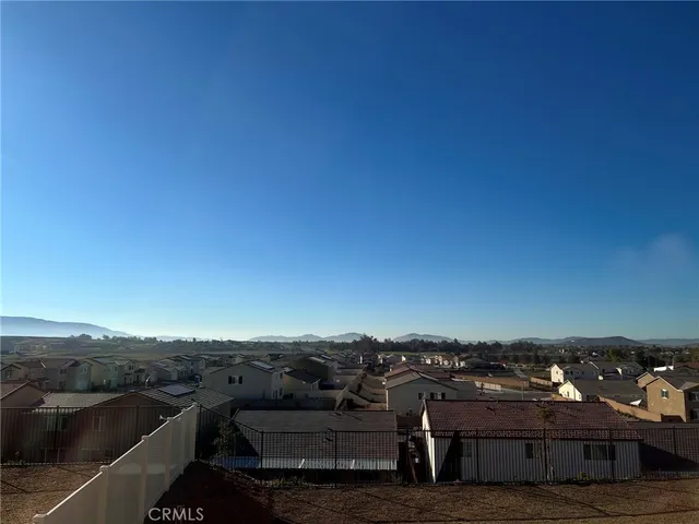 an aerial view of house with beach
