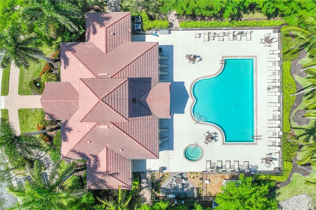 7781 Hawthorne Drive, Unit 3204 Naples, FL 34113 - Photo 40 of 50 an aerial view of a house with outdoor space and a swimming pool