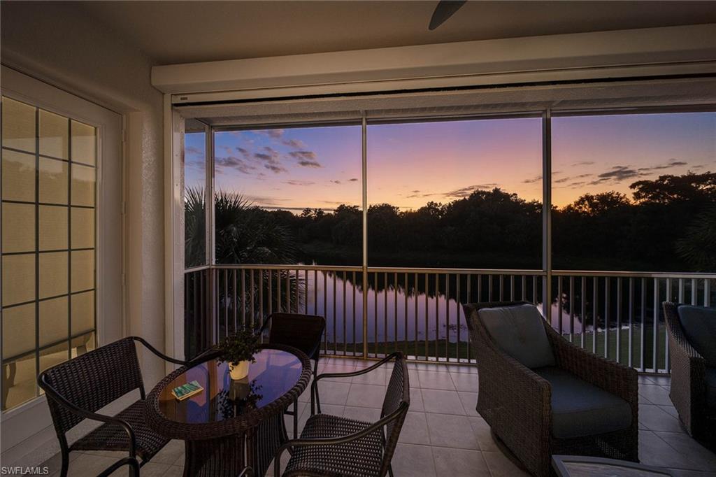 7781 Hawthorne Drive, Unit 3204 Naples, FL 34113 - Photo 5 of 50 a view of a balcony with furniture