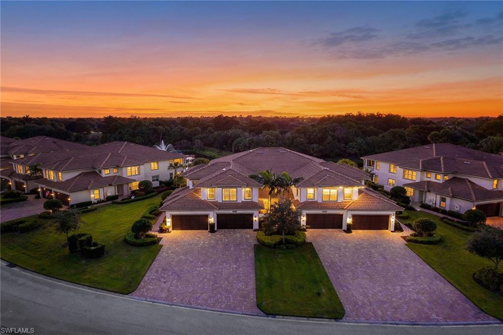 7781 Hawthorne Drive, Unit 3204 Naples, FL 34113 - Photo 7 of 50 an aerial view of houses with yard
