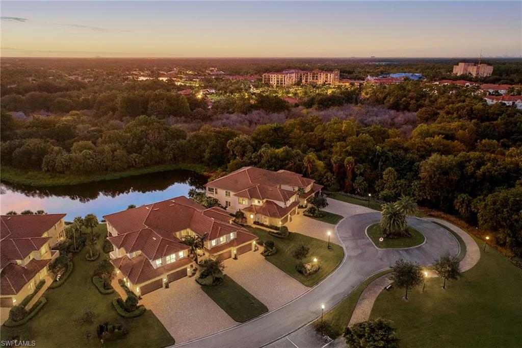 7781 Hawthorne Drive, Unit 3204 Naples, FL 34113 - Photo 8 of 50 an aerial view of residential houses with outdoor space