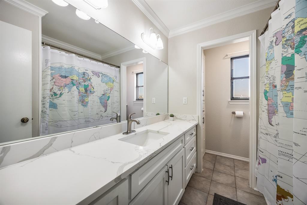 1439 Davis Lane Terrell, TX 75160 - Photo 22 of 33 a bathroom with a double vanity sink mirror and double