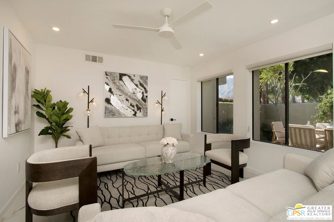 1100 East Amado Road, Unit 13C1 Palm Springs, CA 92262 - Photo 3 of 36 a living room with furniture