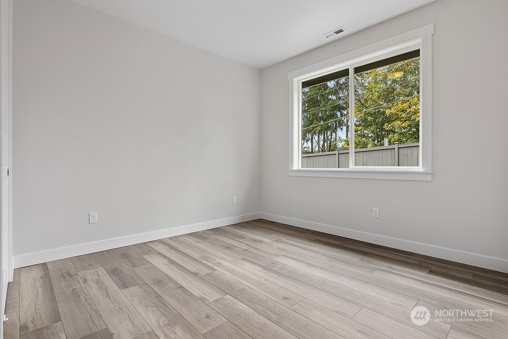 1036 Okerlund Drive Enumclaw, WA 98022 - Photo 18 of 23 an empty room with a window