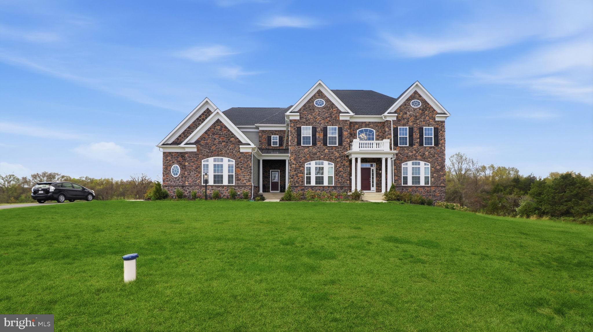 11502 Aden Road Nokesville, VA 20181 - Photo 1 of 106 a front view of a house with a yard