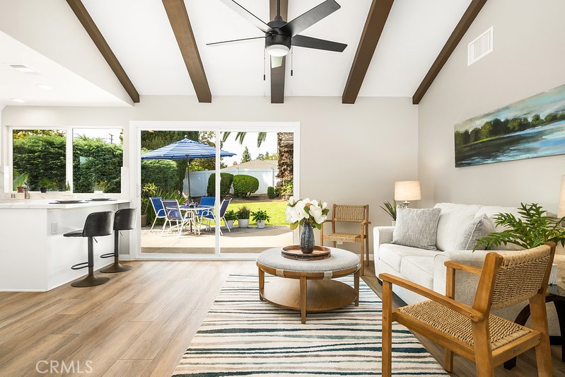14331 Fernbrook Drive Tustin, CA 92780 - Photo 12 of 35 a living room with furniture and a floor to ceiling window