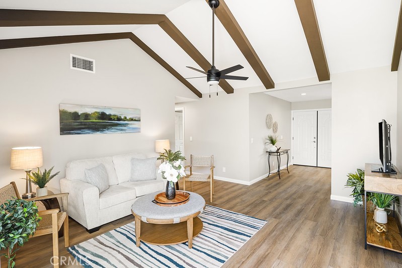 14331 Fernbrook Drive Tustin, CA 92780 - Photo 19 of 35 a living room with furniture and a wooden floor