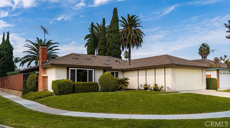 14331 Fernbrook Drive Tustin, CA 92780 - Photo 2 of 35 a view of a yard in front of a house