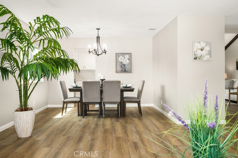 14331 Fernbrook Drive Tustin, CA 92780 - Photo 9 of 35 a view of a dining room with furniture and wooden floor