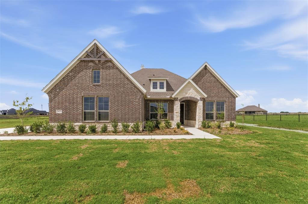 2433 Meteor Drive Krum, TX 76249 - Photo 2 of 29 Brick exterior with stone accents and multiple gables