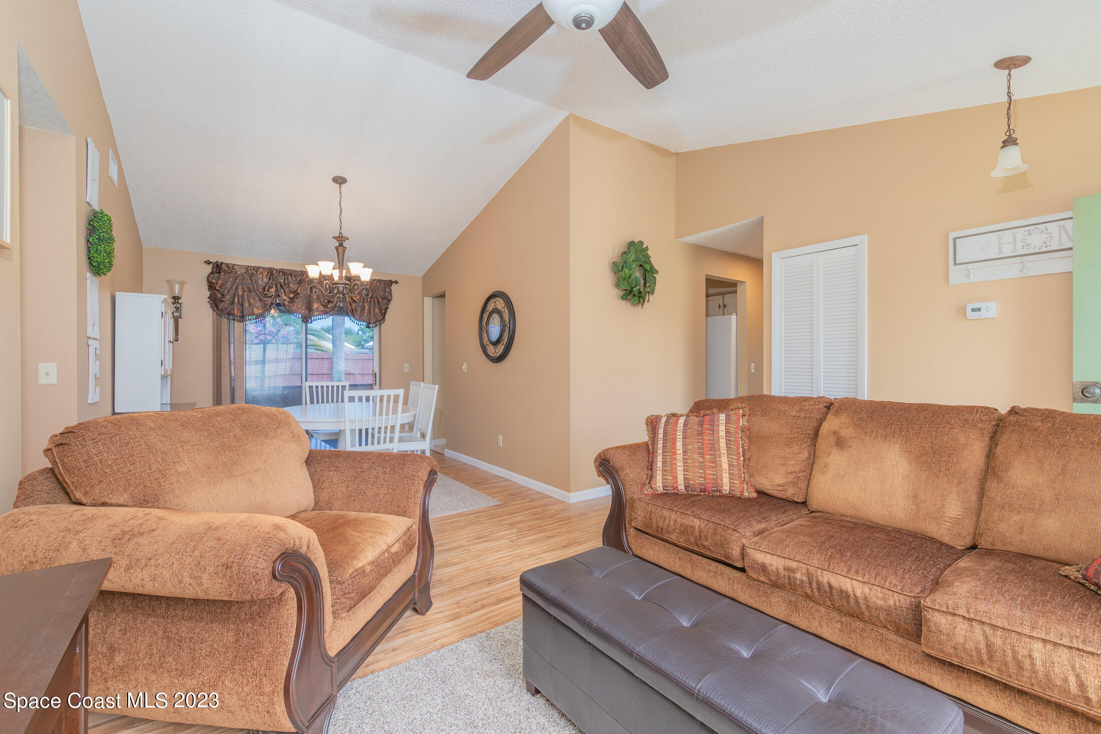 978 Locust Avenue Palm Bay, FL 32907 - Photo 2 of 41 a living room with furniture and a large window