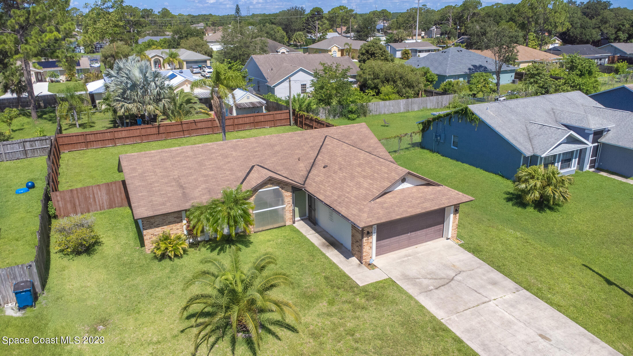 978 Locust Avenue Palm Bay, FL 32907 - Photo 31 of 41 an aerial view of a house with garden space and street view